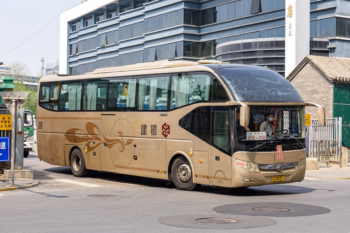 Modern Chinese long-distance touring coach parked at Beijing Liuliqiao passenger transport hub