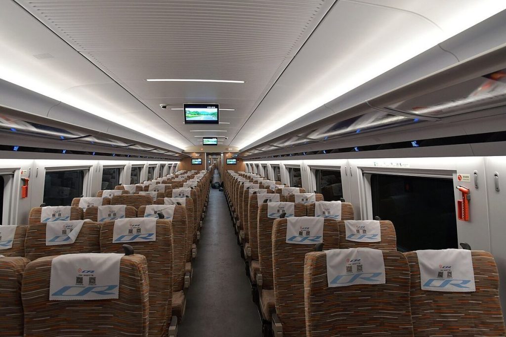 Modern Second Class passenger carriage interior of a China Railway CR400BF Fuxing high-speed bullet train