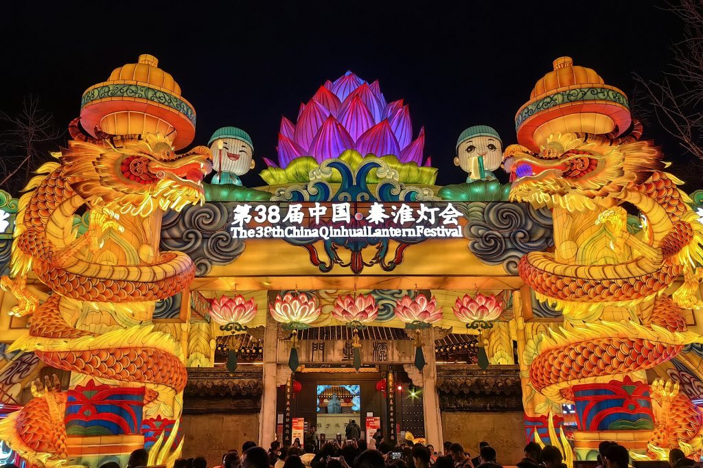 Spectacular illuminated Chinese dragons and glowing red lanterns celebrating Spring Festival at Qinhuai Lantern Festival