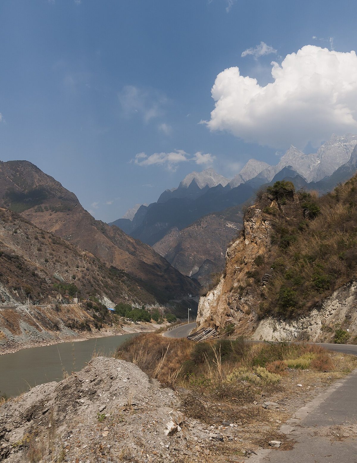 Tiger Leaping Gorge High Trail mountain footpath carved into sheer limestone cliffs